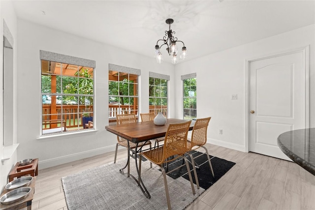4410 Cisco Valley Dr, Round Rock, TX 78664 - dining area featuring light wood-style floors and a chandelier