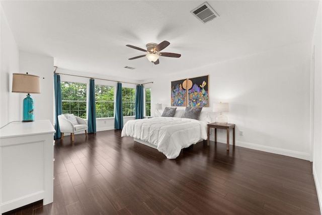 4410 Cisco Valley Dr, Round Rock, TX 78664 - bedroom with dark wood-style flooring and ceiling fan