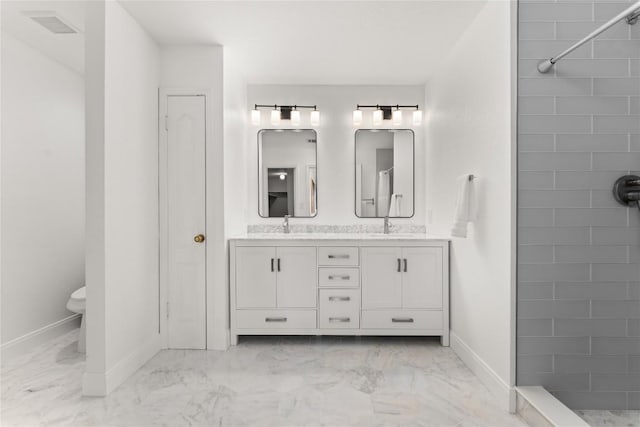 4410 Cisco Valley Dr, Round Rock, TX 78664 - full bath with marble finish floors, double vanity, and tiled shower