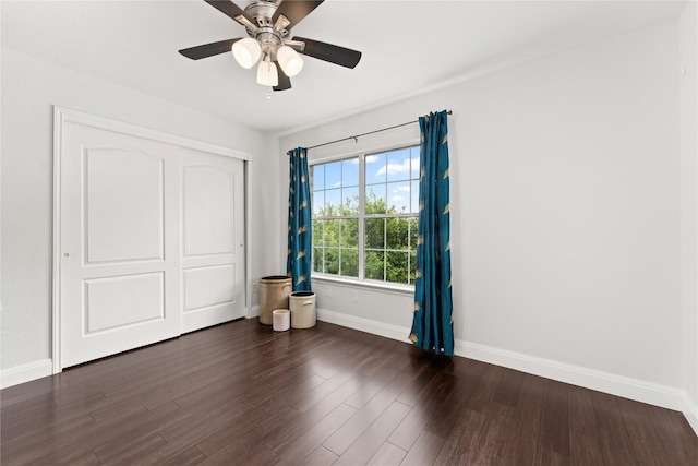 4410 Cisco Valley Dr, Round Rock, TX 78664 - unfurnished bedroom with wood finished floors, a closet, and a ceiling fan