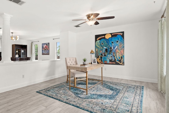 4410 Cisco Valley Dr, Round Rock, TX 78664 - home office featuring ornate columns, ceiling fan, and wood finished floors