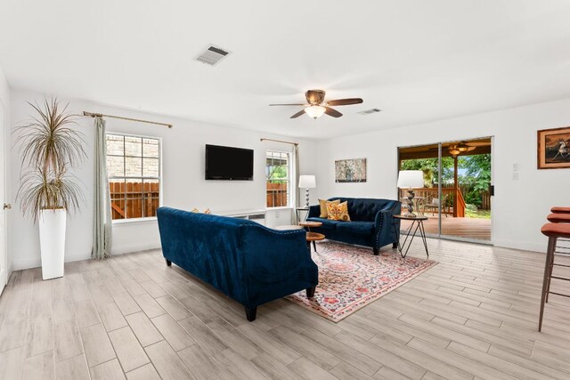 4410 Cisco Valley Dr, Round Rock, TX 78664 - living room with a ceiling fan and light wood finished floors