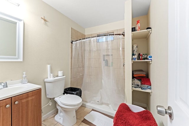 300 Walker St, Smithville, TX 78957 - bathroom featuring vanity, tile patterned floors, and a tile shower