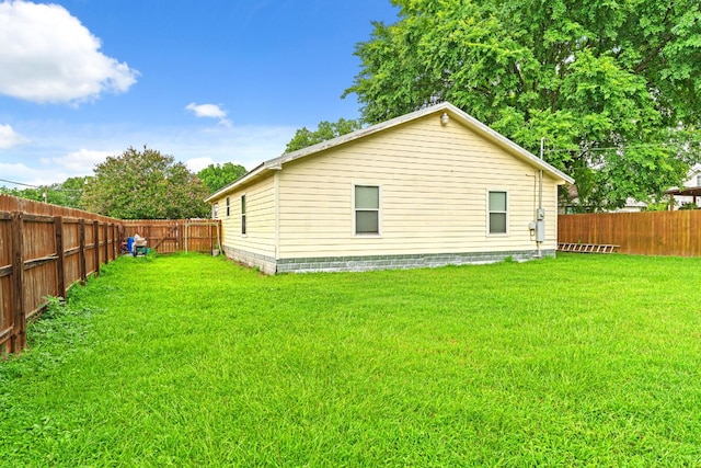 300 Walker St, Smithville, TX 78957 - back of house with a fenced backyard