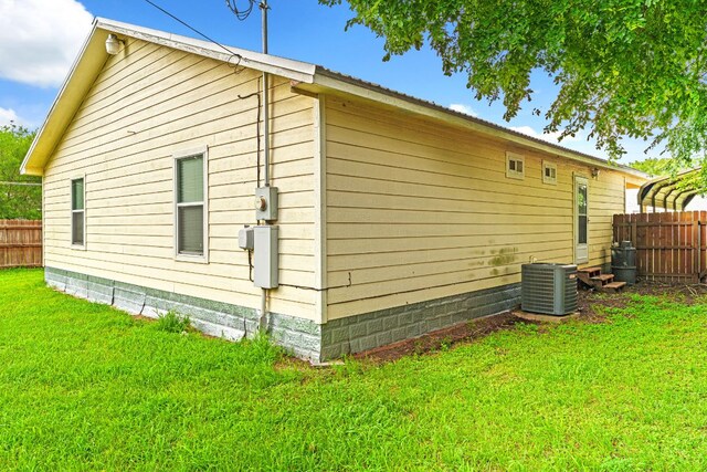 300 Walker St, Smithville, TX 78957 - view of home's exterior featuring a central air condition unit