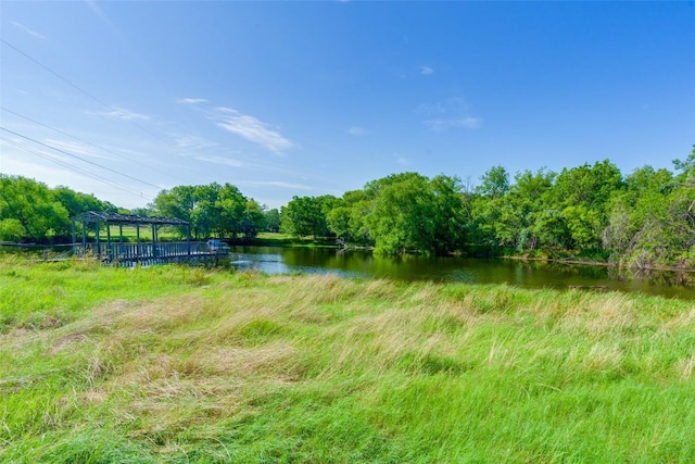 10745 Rosemar Ln, Adkins, TX 78101 - view of yard with a water view and a pergola