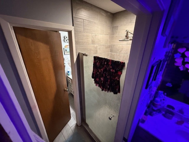 410 Phoenix Dr, Temple, TX 76504 - bathroom with tile patterned floors and a shower stall