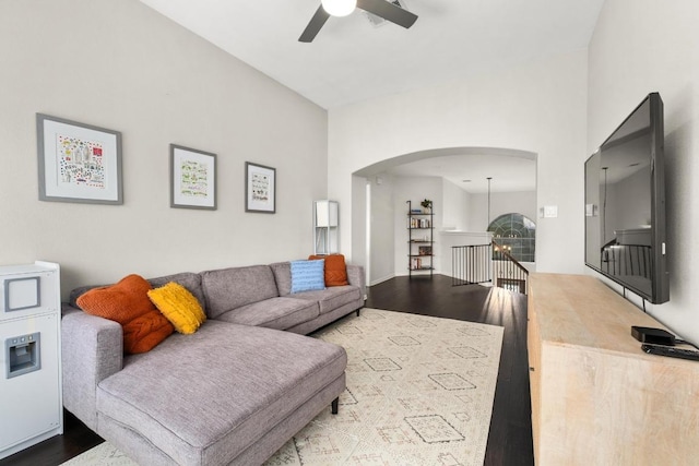 5701 Sunset Rdg, Austin, TX 78735 - living room featuring ceiling fan, wood finished floors, and arched walkways