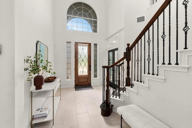 5701 Sunset Rdg, Austin, TX 78735 - foyer with a towering ceiling, stairway, and plenty of natural light
