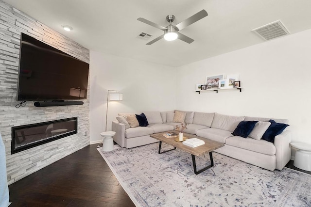 5701 Sunset Rdg, Austin, TX 78735 - living area featuring a fireplace, wood finished floors, and ceiling fan