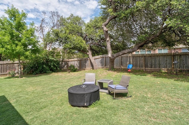 5701 Sunset Rdg, Austin, TX 78735 - fenced backyard featuring an outdoor fire pit