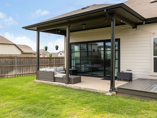 453 Arrowhead Vine St, Leander, TX 78641 - back of house with a fenced backyard, an outdoor living space, a patio, and a shingled roof