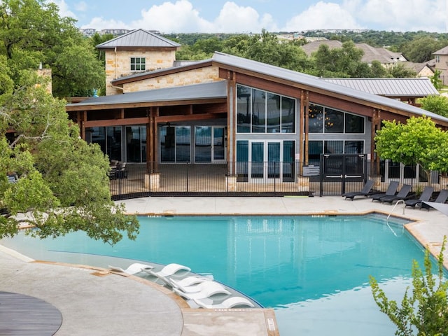 453 Arrowhead Vine St, Leander, TX 78641 - swimming pool featuring a patio area