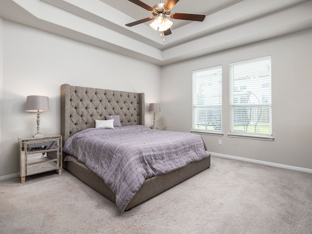 453 Arrowhead Vine St, Leander, TX 78641 - carpeted bedroom featuring a raised ceiling and ceiling fan