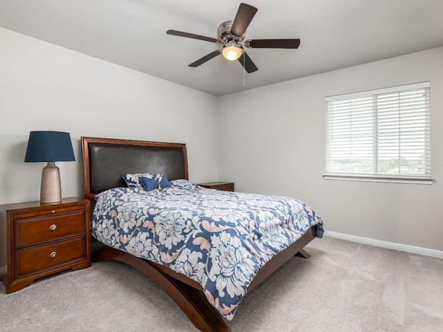 453 Arrowhead Vine St, Leander, TX 78641 - carpeted bedroom with baseboards and a ceiling fan