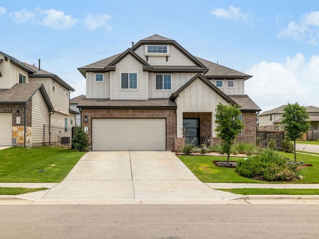453 Arrowhead Vine St, Leander, TX 78641 - craftsman house with board and batten siding, concrete driveway, brick siding, a garage, and roof with shingles