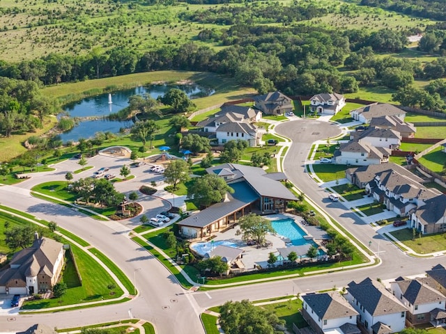 453 Arrowhead Vine St, Leander, TX 78641 - drone / aerial view of a large body of water and a pool area