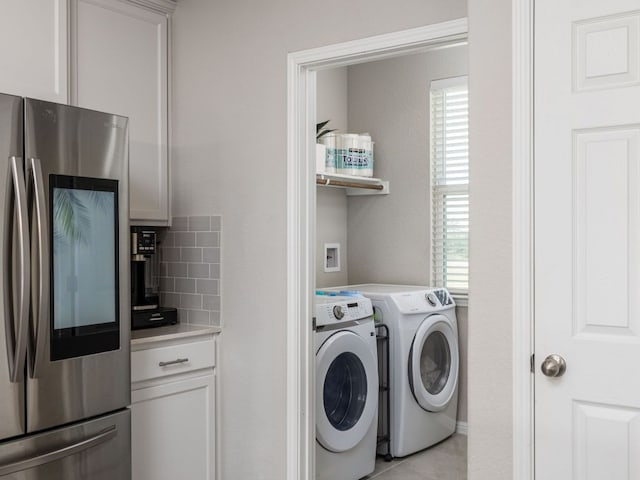 453 Arrowhead Vine St, Leander, TX 78641 - washroom featuring independent washer and dryer and light tile patterned floors