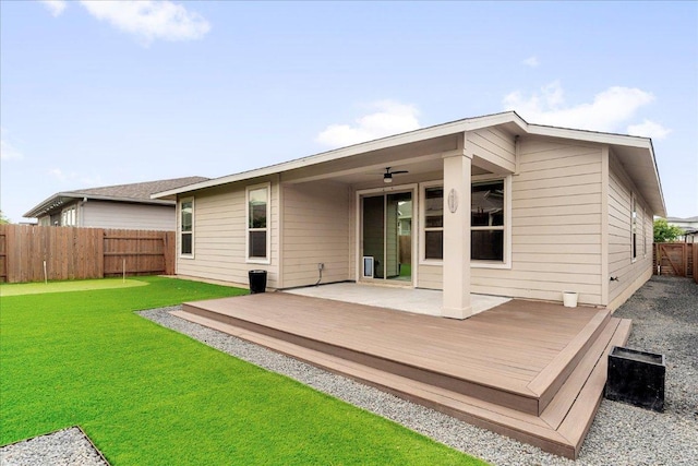 8213 Spire Vw, Austin, TX 78744 - rear view of house featuring a fenced backyard and a wooden deck