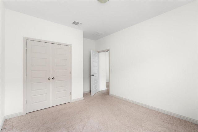 8213 Spire Vw, Austin, TX 78744 - unfurnished bedroom featuring carpet flooring and a closet