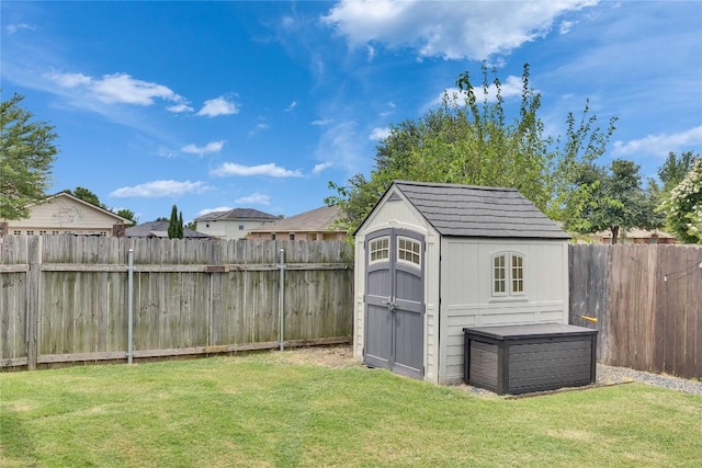 239 Holman Path, Hutto, TX 78634 - fenced backyard with a shed
