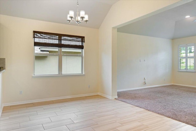 2520 Milan Meadows Dr, Leander, TX 78641 - unfurnished room featuring lofted ceiling, wood tiled floors, and a chandelier