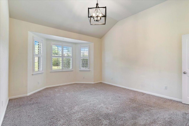 2520 Milan Meadows Dr, Leander, TX 78641 - spare room featuring vaulted ceiling, carpet floors, and a chandelier