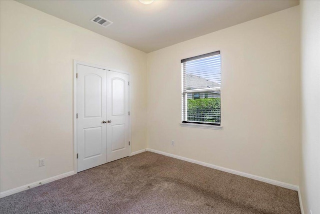 2520 Milan Meadows Dr, Leander, TX 78641 - unfurnished bedroom featuring carpet flooring and a closet
