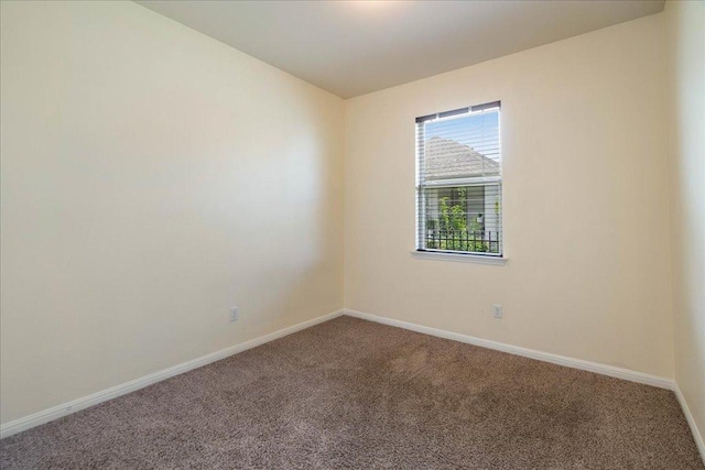 2520 Milan Meadows Dr, Leander, TX 78641 - spare room featuring carpet flooring and baseboards
