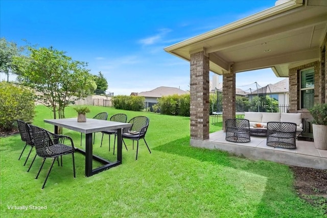 2520 Milan Meadows Dr, Leander, TX 78641 - fenced backyard featuring outdoor lounge area, a patio area, and outdoor dining space