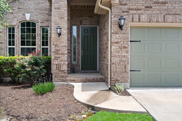 2520 Milan Meadows Dr, Leander, TX 78641 - property entrance featuring brick siding and an attached garage