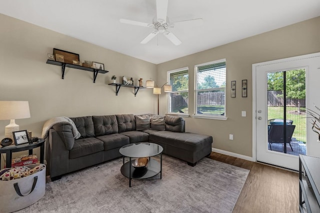 1420 Anhalt Dr Unit 50B, Pflugerville, TX 78660 - living room with wood finished floors and a ceiling fan