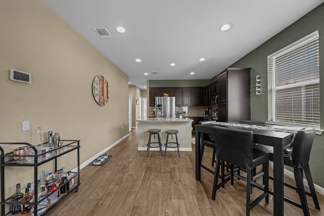 1420 Anhalt Dr Unit 50B, Pflugerville, TX 78660 - dining area with light wood finished floors and recessed lighting