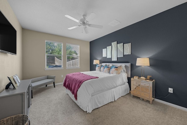 1420 Anhalt Dr Unit 50B, Pflugerville, TX 78660 - bedroom with light colored carpet and ceiling fan