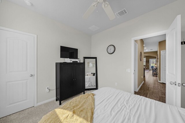 1420 Anhalt Dr Unit 50B, Pflugerville, TX 78660 - bedroom featuring arched walkways and a ceiling fan