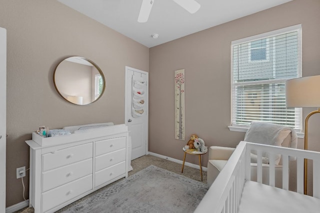 1420 Anhalt Dr Unit 50B, Pflugerville, TX 78660 - bedroom featuring a crib and a ceiling fan