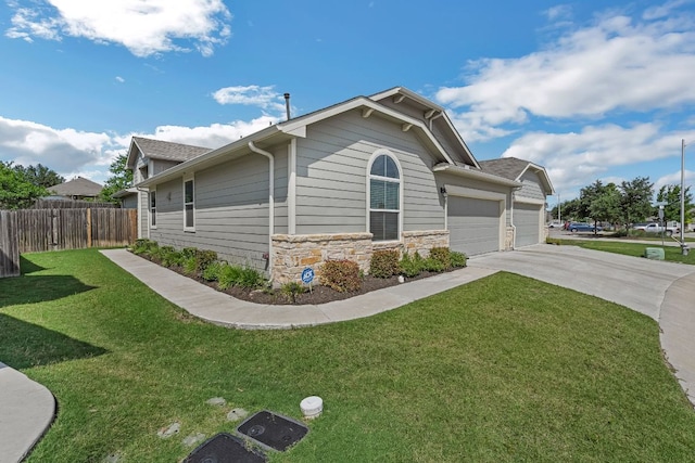 1420 Anhalt Dr Unit 50B, Pflugerville, TX 78660 - view of property exterior featuring a garage, driveway, and stone siding