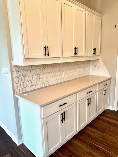 370 Milkwood Ter, Dripping Springs, TX 78620 - detailed view of wood finished floors and backsplash