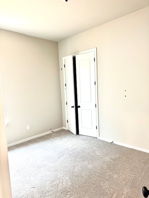 370 Milkwood Ter, Dripping Springs, TX 78620 - carpeted empty room with baseboards