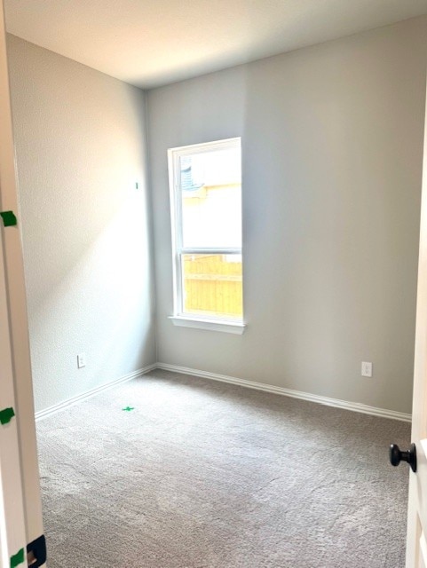370 Milkwood Ter, Dripping Springs, TX 78620 - carpeted empty room featuring baseboards