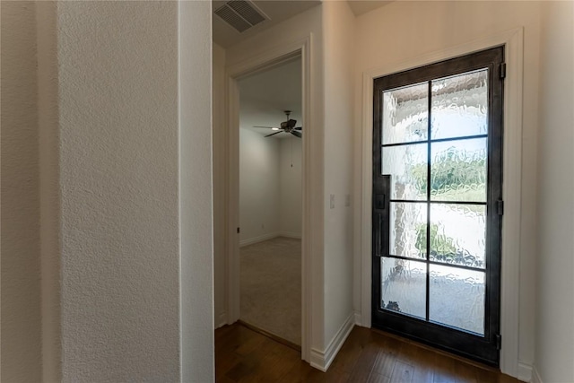 152 Limestone Dr, Georgetown, TX 78628 - entryway featuring dark wood finished floors and baseboards
