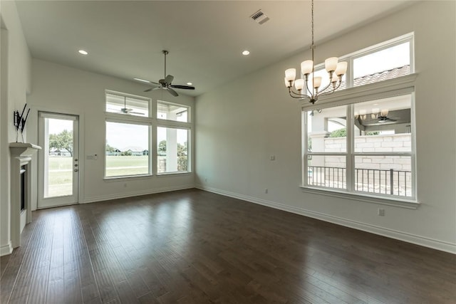 152 Limestone Dr, Georgetown, TX 78628 - spare room with a ceiling fan, healthy amount of natural light, a chandelier, dark wood-type flooring, and recessed lighting