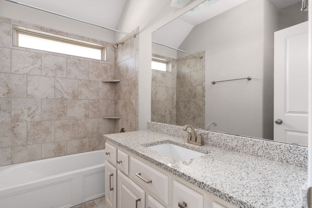 103 County Road 180 Unit 35, Leander, TX 78641 - full bathroom with vanity, shower / bathtub combination, and vaulted ceiling