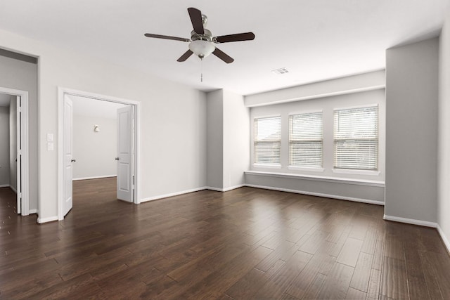 103 County Road 180 Unit 35, Leander, TX 78641 - spare room with dark wood-style floors and ceiling fan