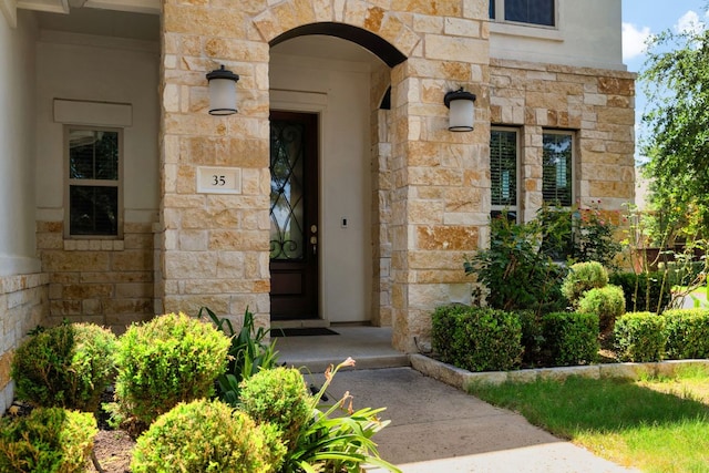 103 County Road 180 Unit 35, Leander, TX 78641 - view of exterior entry featuring stone siding