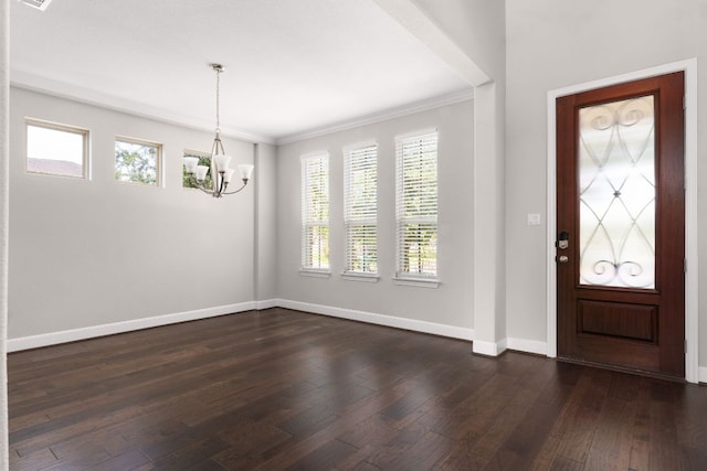 103 County Road 180 Unit 35, Leander, TX 78641 - entryway with a chandelier, healthy amount of natural light, dark wood-style floors, and ornamental molding