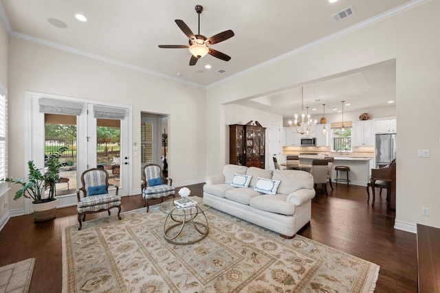 223 Delfino Cir, Austin, TX 78734 - living room with plenty of natural light, dark wood-style flooring, a chandelier, a ceiling fan, and recessed lighting