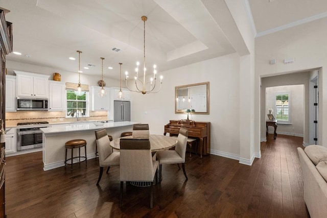 223 Delfino Cir, Austin, TX 78734 - dining space featuring a chandelier, dark wood-style flooring, and recessed lighting