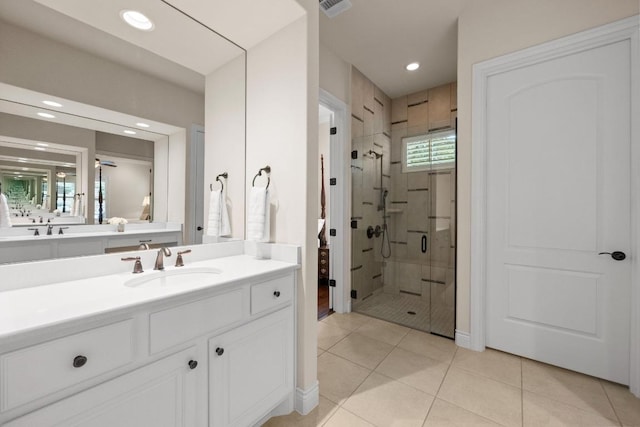 223 Delfino Cir, Austin, TX 78734 - full bathroom featuring a shower stall, vanity, tile patterned floors, and recessed lighting