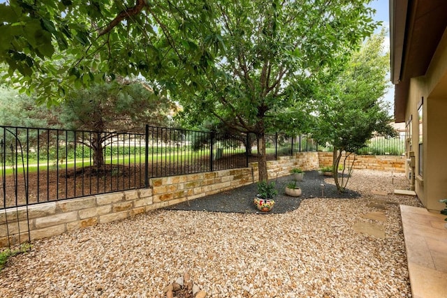 223 Delfino Cir, Austin, TX 78734 - fenced backyard with a patio